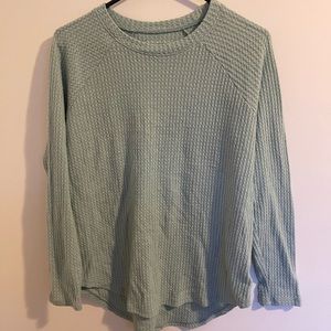 Light teal coloured sweater